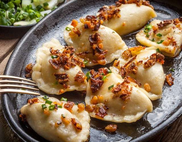 Dumplings with sauerkraut and pork cracklings(Вареники с квашеной капустой и шкварками) 400g